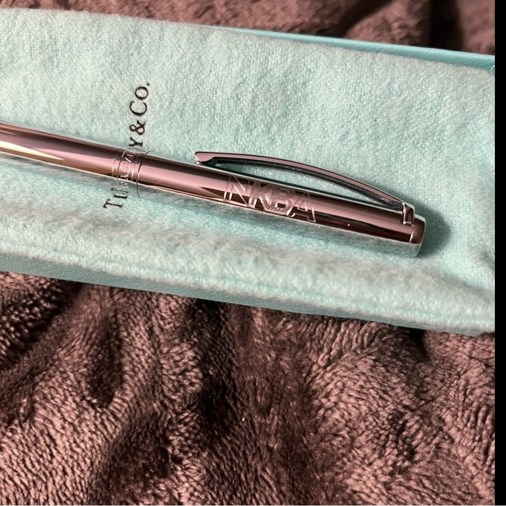 Tiffany and Co. Chrome NKBA pen, box, pouch, bag & ribbon.